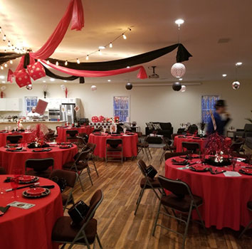event center with red table cloths
